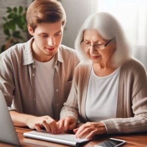 email-setup- London Young technician assisting an elderly lady with setting up her email on a desktop computer in London. The well-lit image showcases a friendly, supportive environment, perfect for promoting email setup and migration services. Highlighting digital literacy, personalised support, and intergenerational tech assistance.